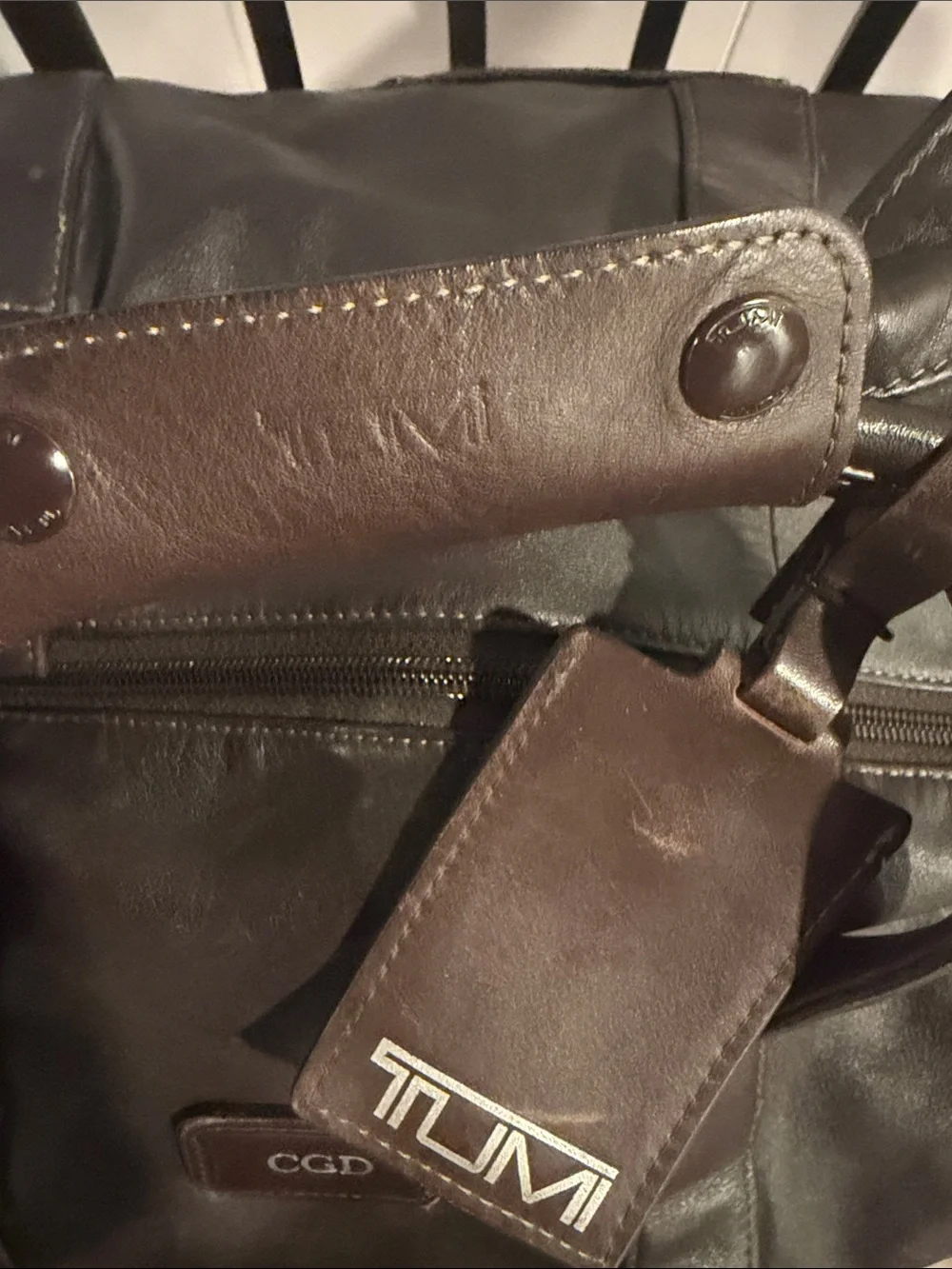 Tumi Dark Brown Leather Duffel with Striped Shoulder Strap